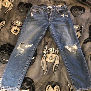 Straight leg ankle length high waisted jeans.